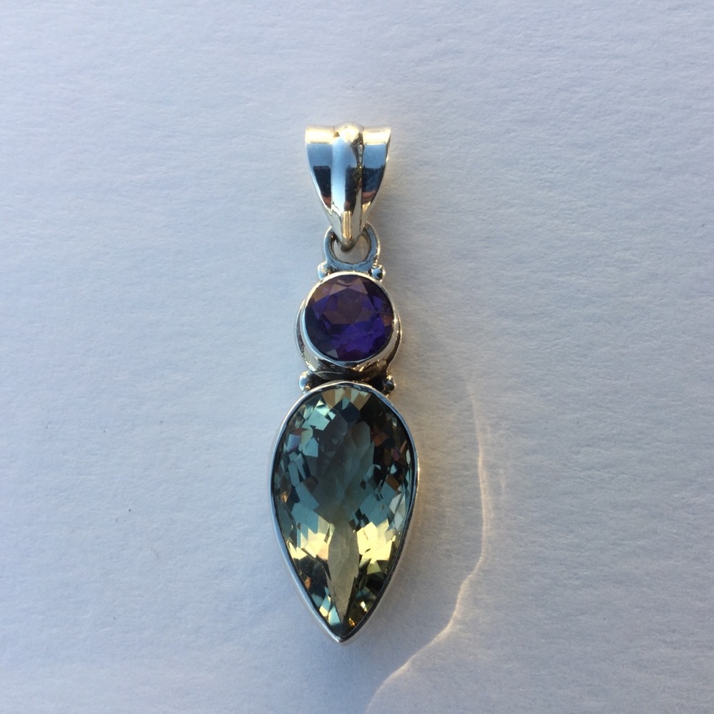 New faceted sterling silver gemstone pendant.